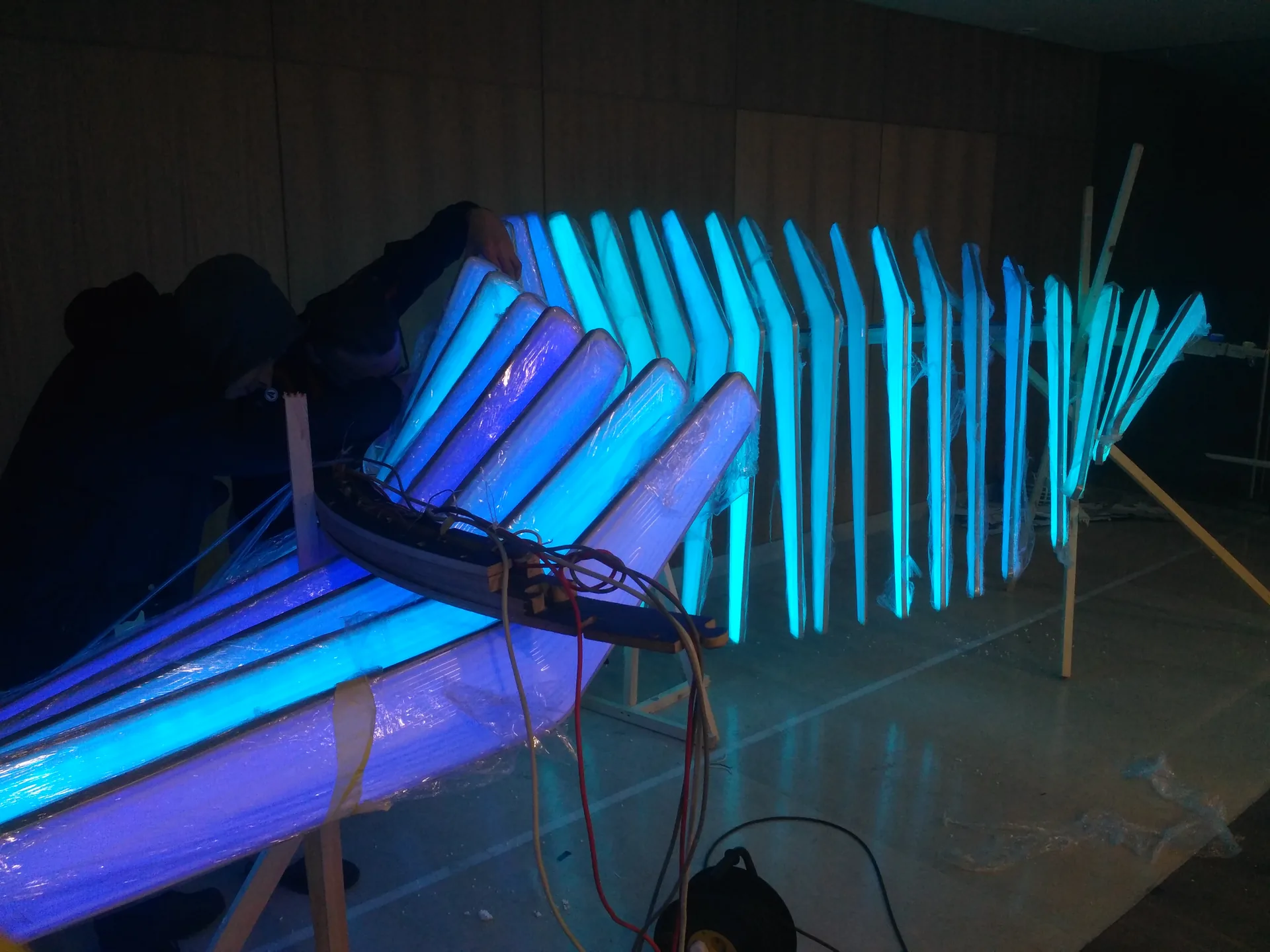 Illuminated sections of the light sculpture during assembly and system testing.