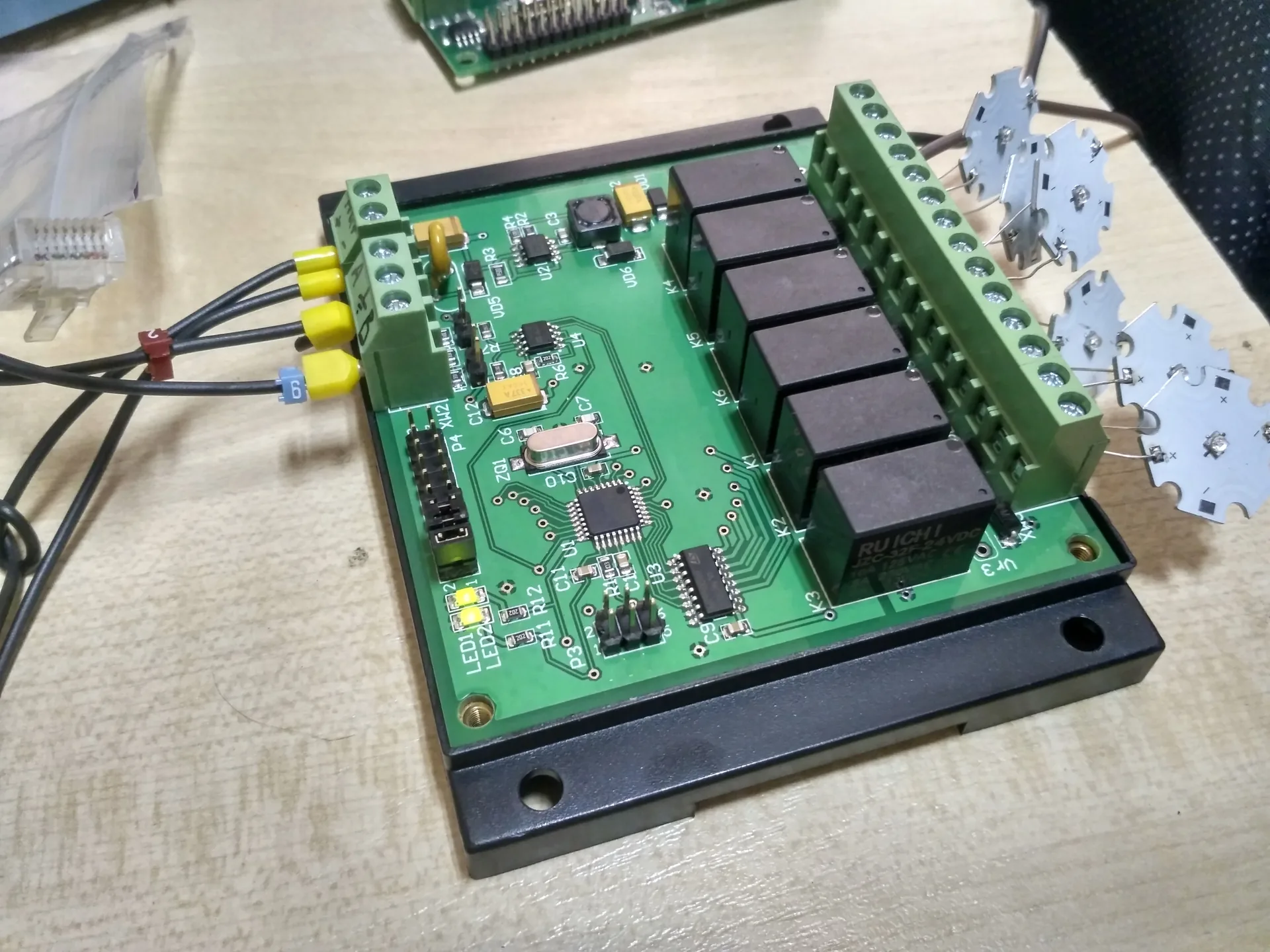 Finished custom controller with relay outputs and connected LED modules.