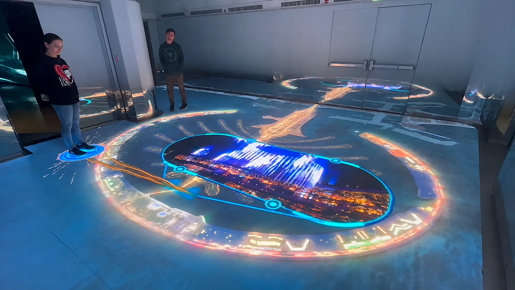 Visitors exploring the movement-responsive interactive LED floor.
